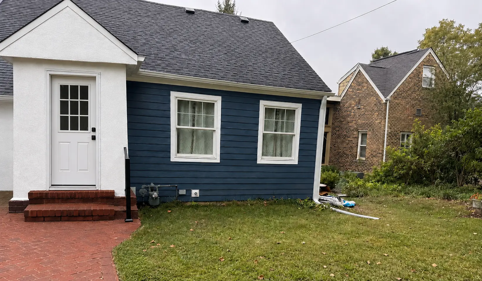 White double-hung windows installed during a home window replacement project in DuPage County.