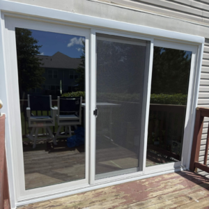 New white sliding patio door installed at a Naperville home.