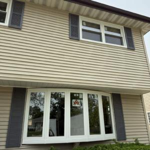 White replacement windows installed on the exterior of a home in Lombard, Illinois.